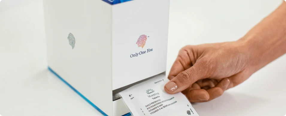 hands holding capsules